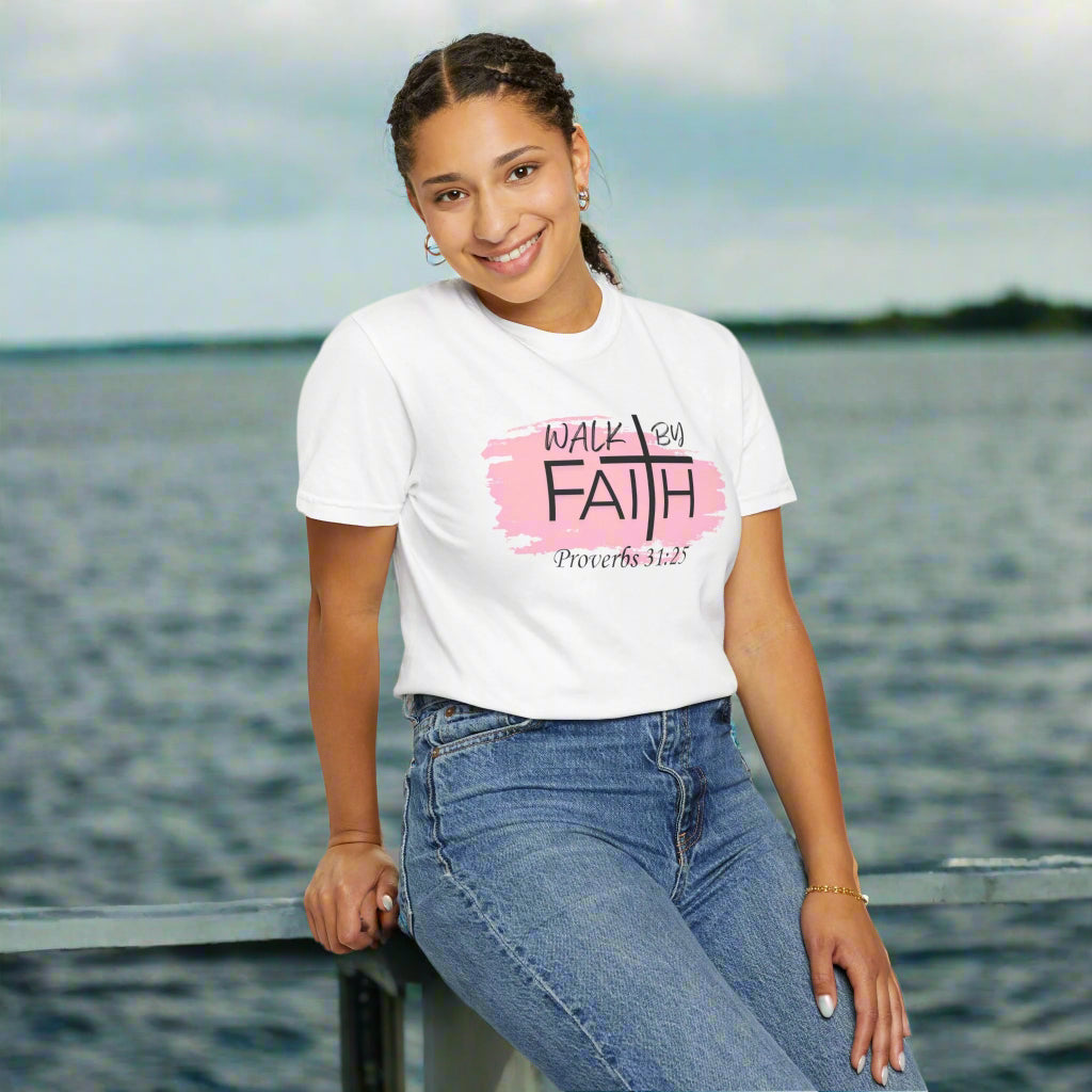 "Confident young woman of faith wearing inspirational Proverbs 31:25 Christian shirt, symbolizing strength, dignity, and walking boldly in God’s promises."